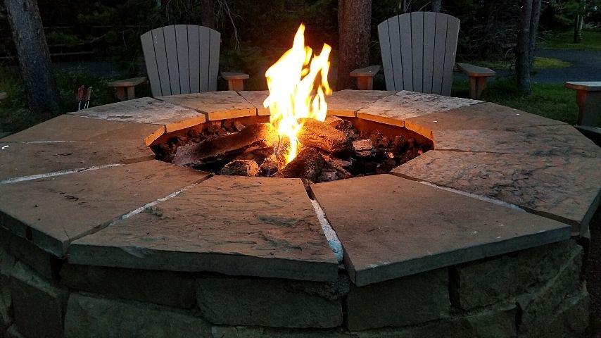 Stone fire pits have air vents installed at the bottom of the hole and are immovable