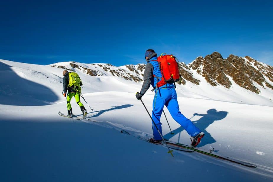 Two alpinist skiers during a ski mountaineering trip