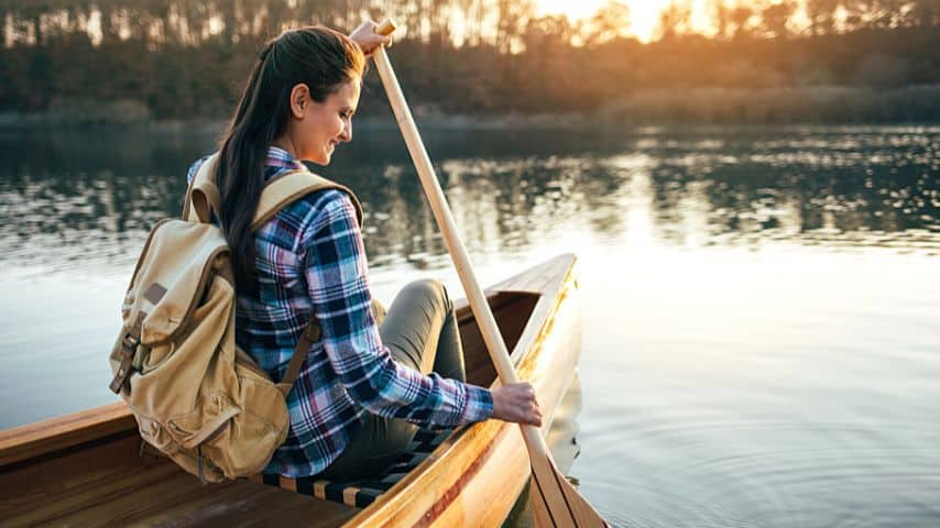 Sitting or kneeling helps keep your center of gravity low, preventing your canoe from tipping over