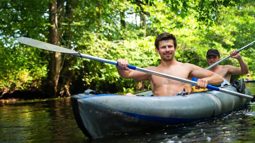 Chest muscles are not directly involved in the paddling,  As your arm pulls on the paddle, your chest lurches forward and relaxes in sync